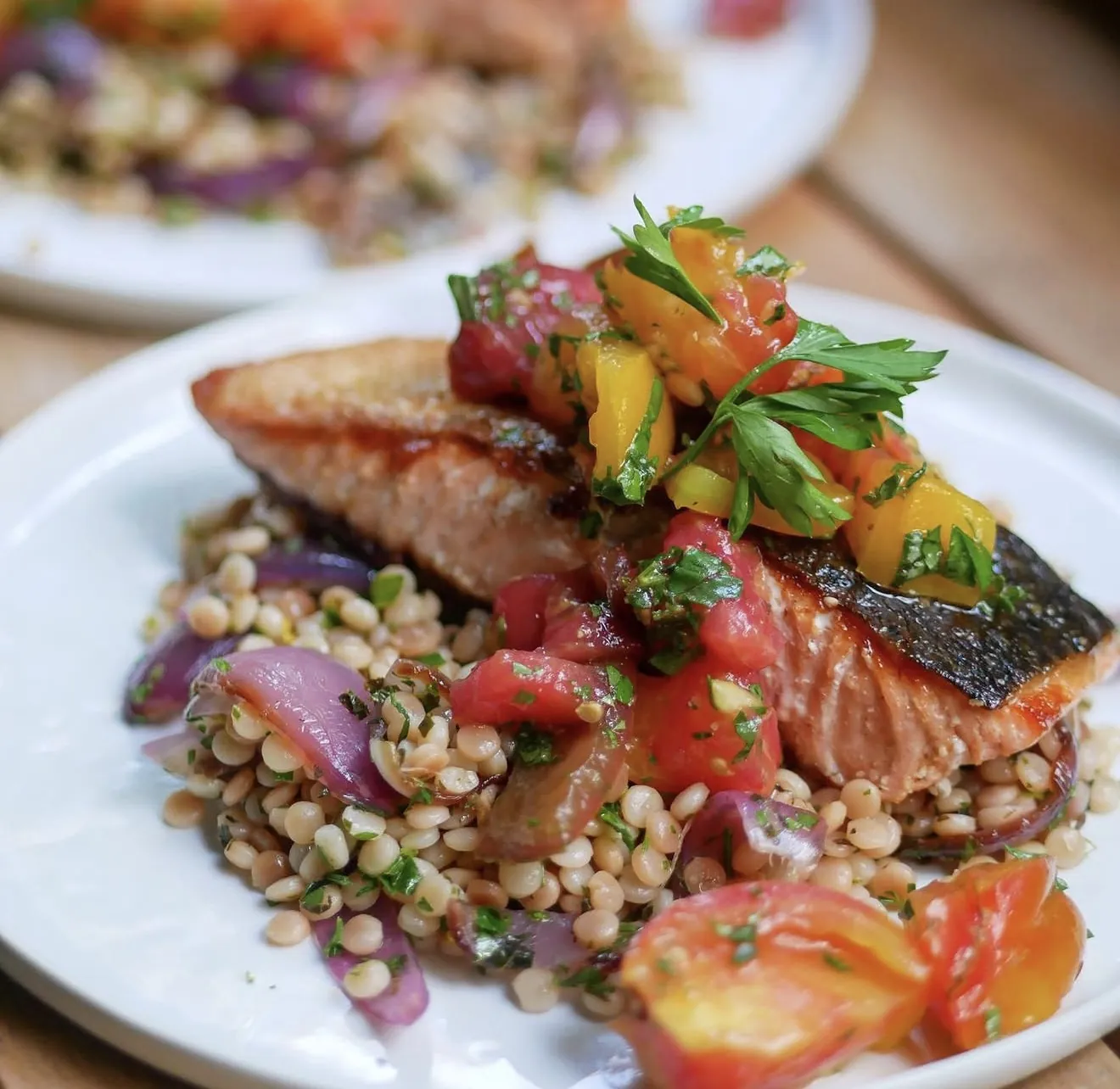Sesame-crusted miso salmon with pink rice, garlicky green beans, and ginger-scallion sauce.