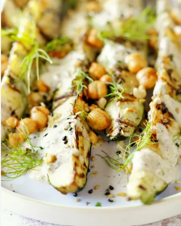 Grilled zucchini with lemon-garlic yogurt, toasted breadcrumbs, and Aleppo pepper. not real picture