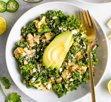 Massaged kale salad with snap peas, sweet corn, torn sourdough croutons, and date-shallot-lemon dressing.